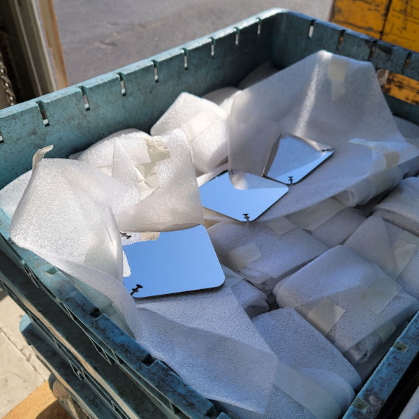 Polished sculpture segments ready to go in box.