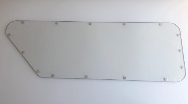 Completed angled sailboat window cleaned up after waterjet cutting